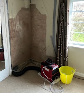 dehumidifier drying walls in south west London